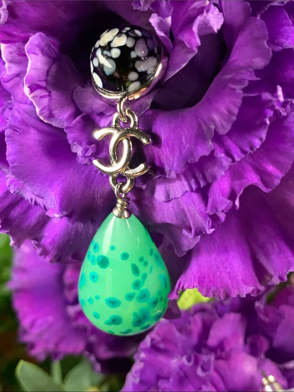 Limited edition authentic Chanel gorgeous earrings with real stones,cc logo.